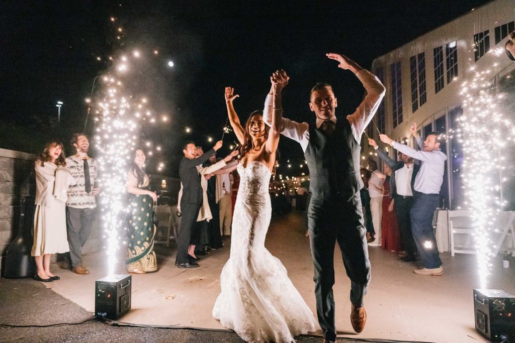 Couple entrance with cold spark fountains