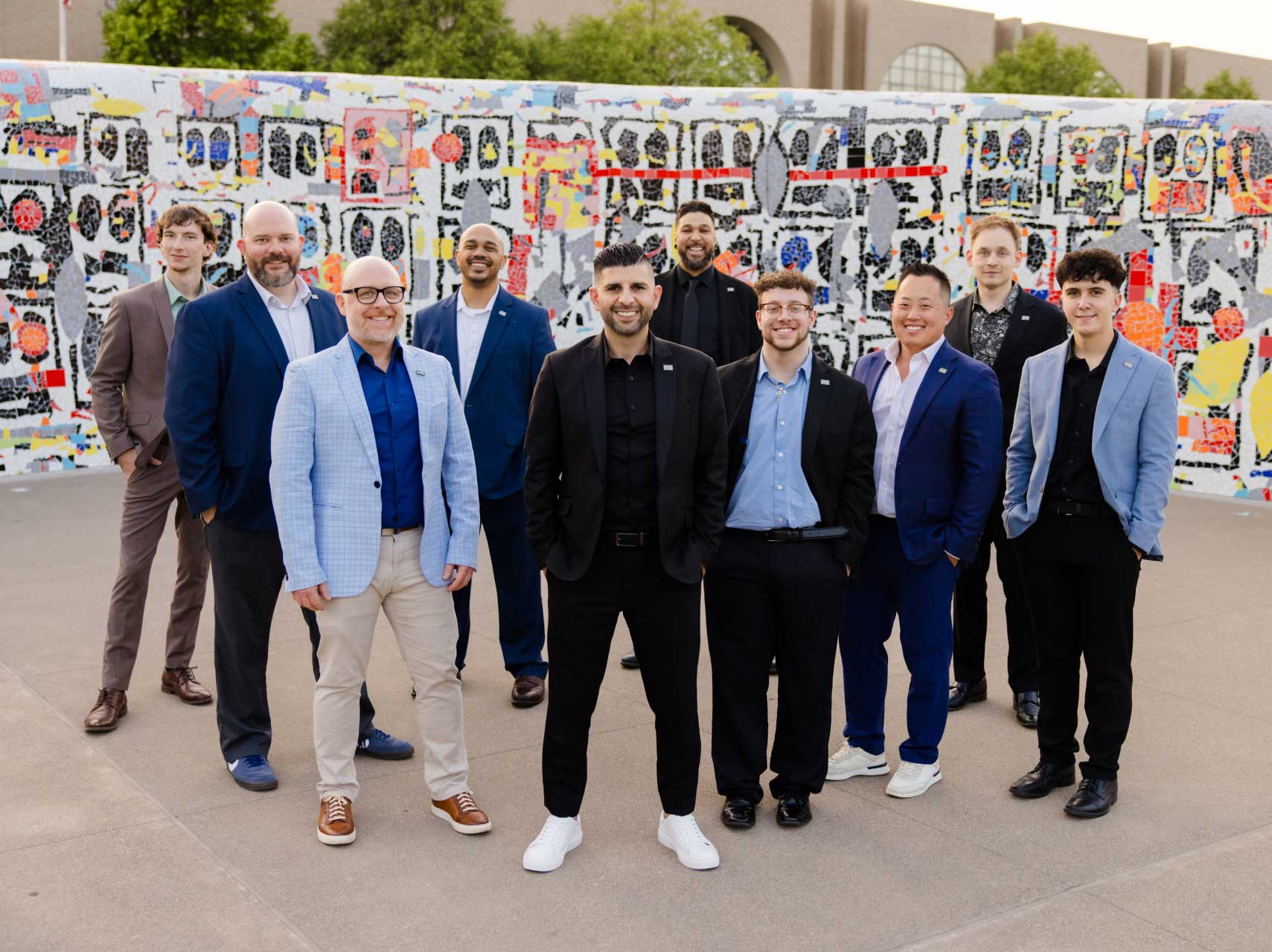 marquee-team-in-front-of-mosaic Marquee team in front of mosaic
