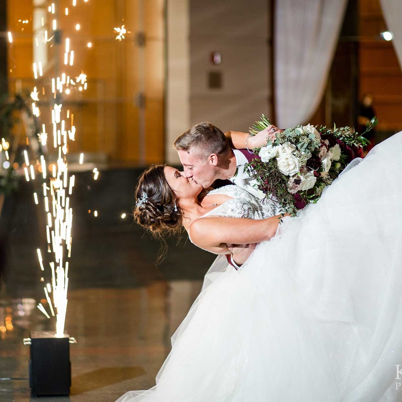 Bride groom kiss cold spark fountains